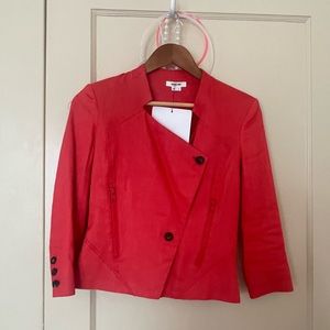 Don’t use it. Like new. Color is reddish coral